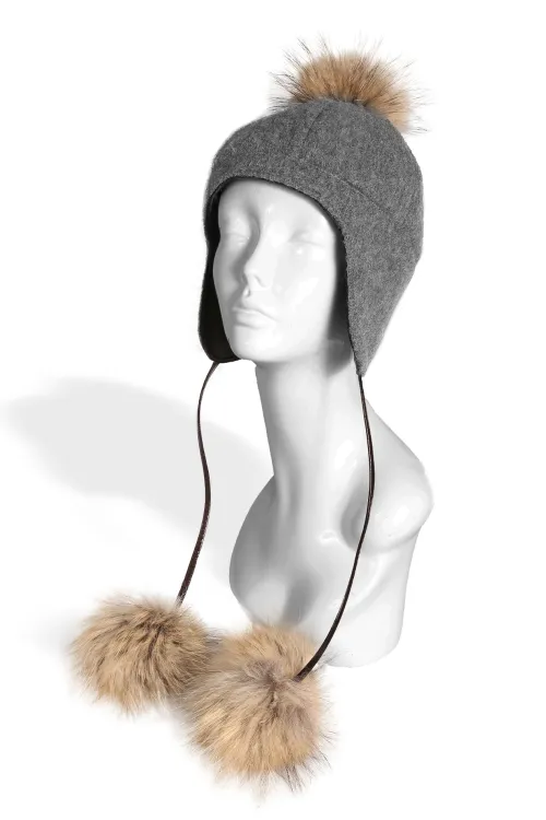 Grey wool hat with Finn-raccoon pompons | Fur hats | BILODEAU Canada
